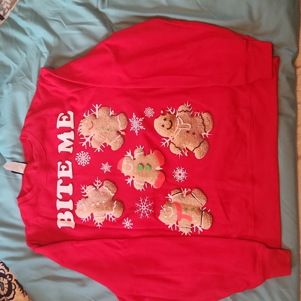 Christmas sweat shirt. Red with gingerbread men. Size L.